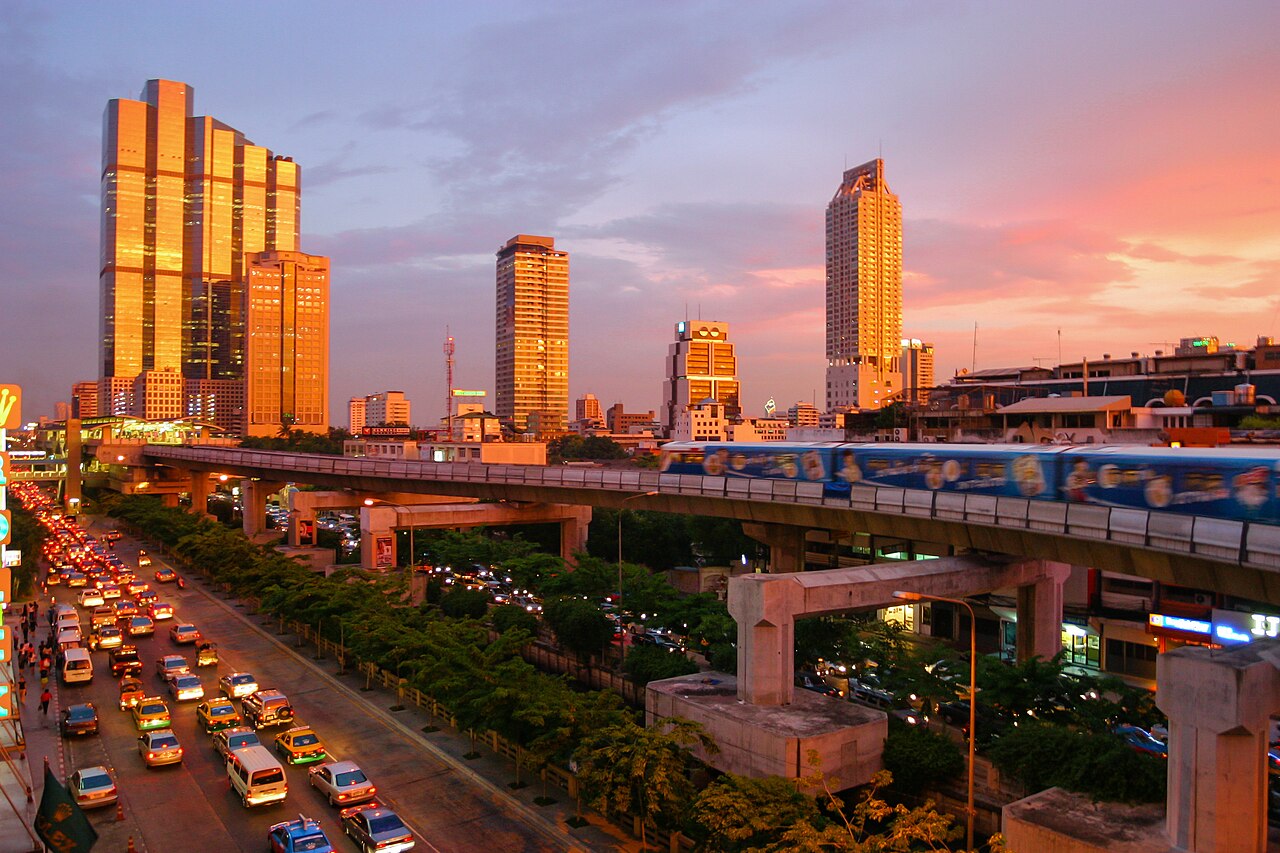 Bangkok skyline with skytrain at sunset